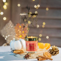 carrousel bougie cannelle orange